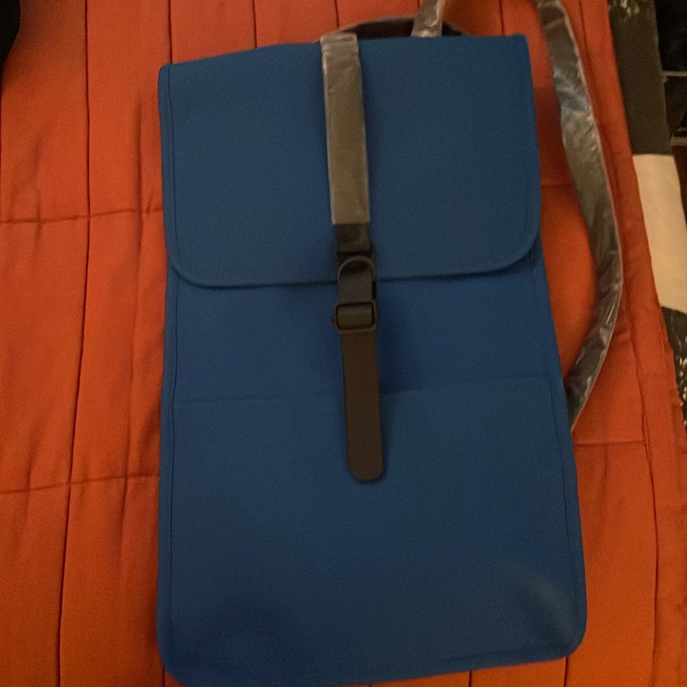 NWT authentic blue RAINS backpack in Waves